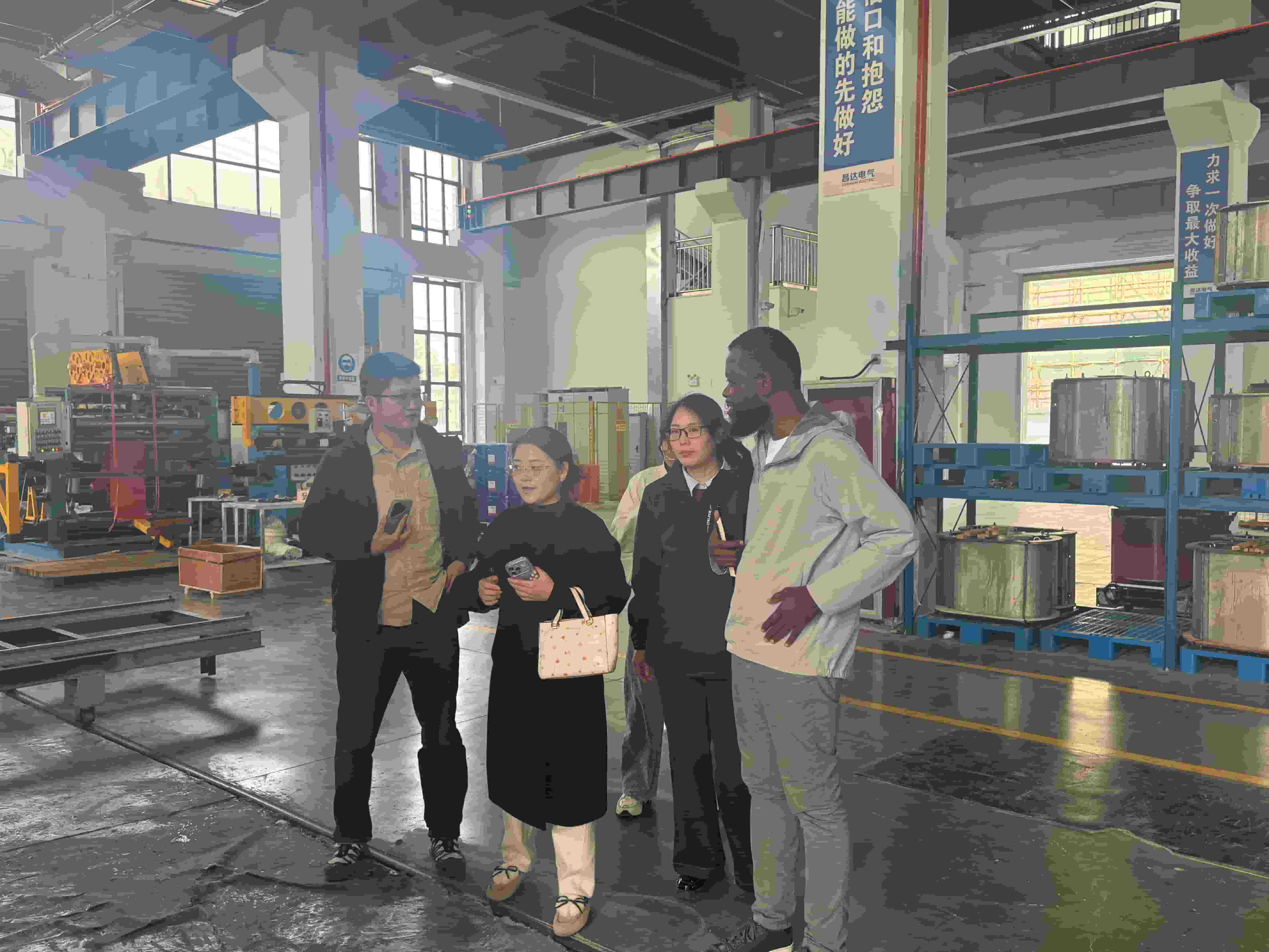 Tanzanian clients visit the production line of Beyondt's transformer factory.